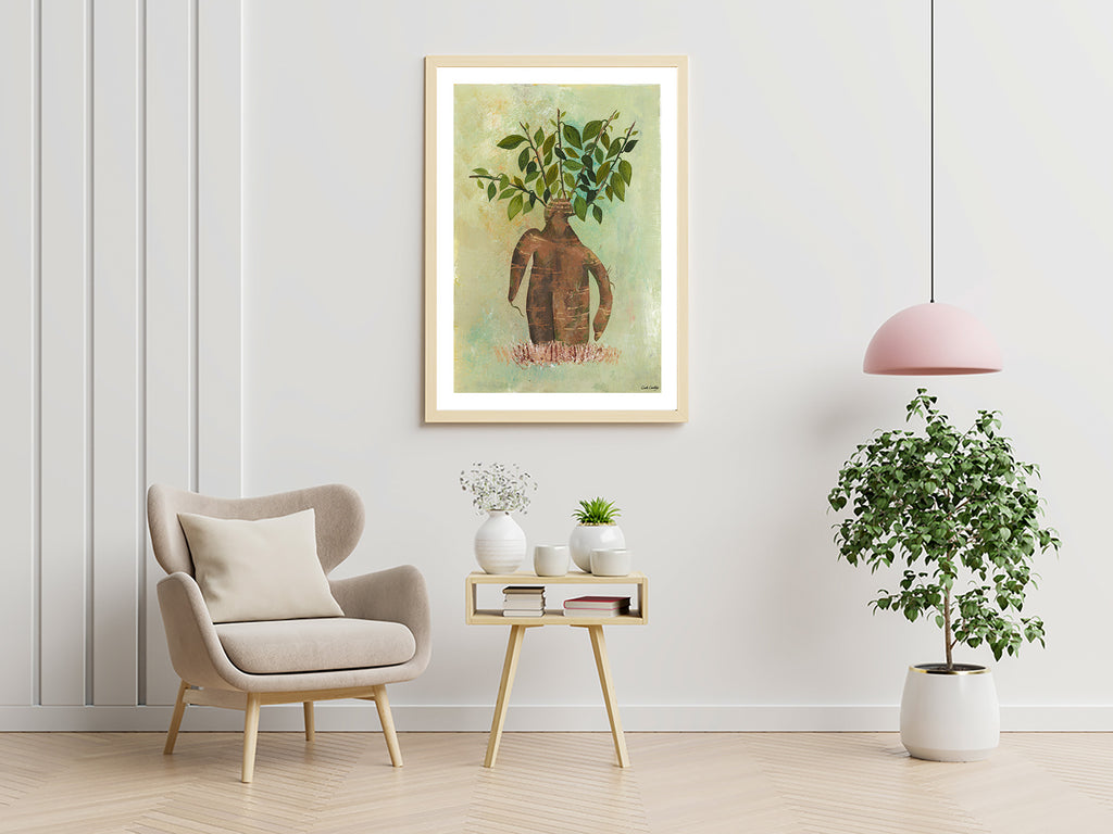 Affiche encadrée représentant un homme arbre, silhouette brune et feuilles vertes